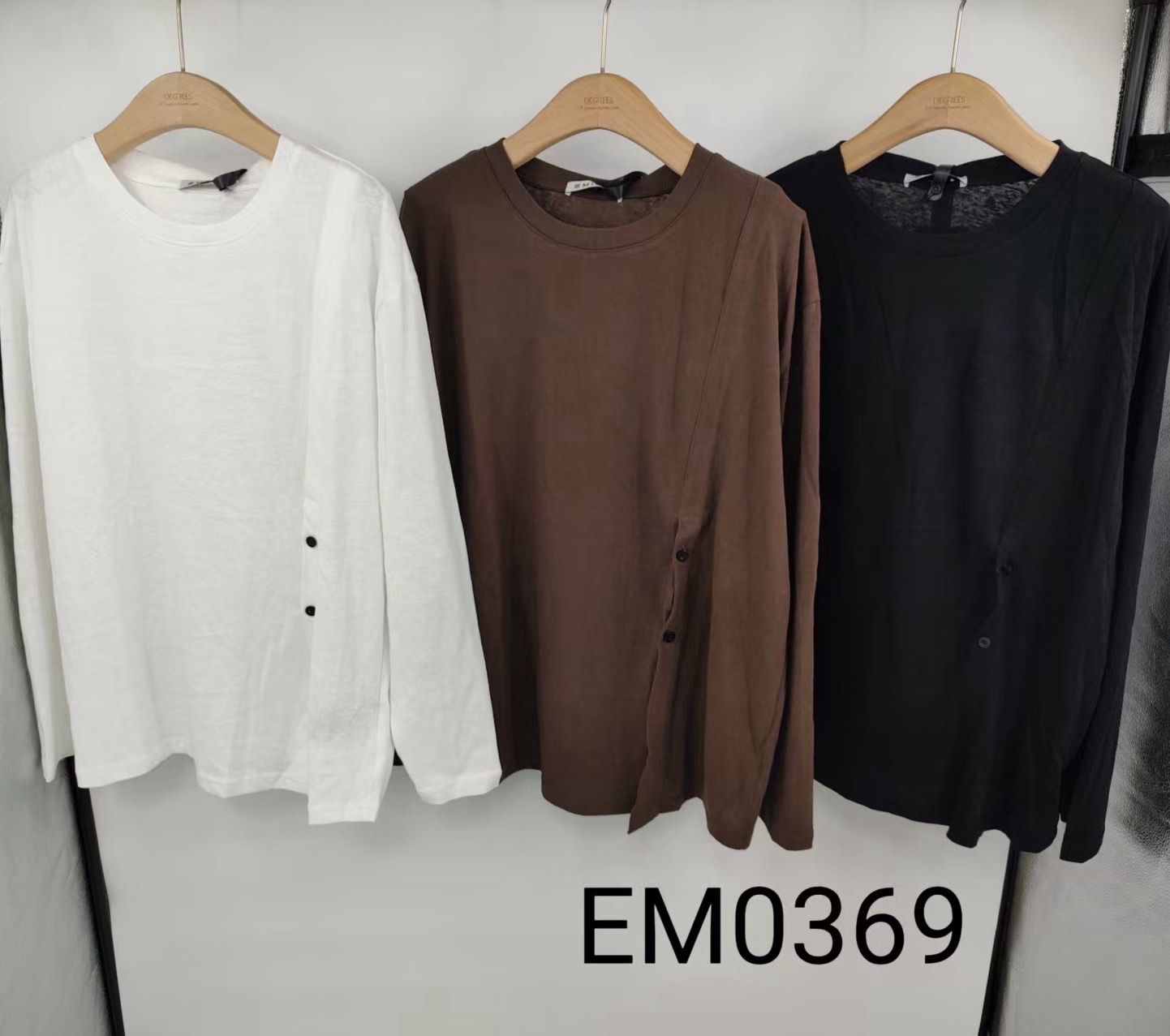 Bluse mit asymmetrischer Knopfleiste